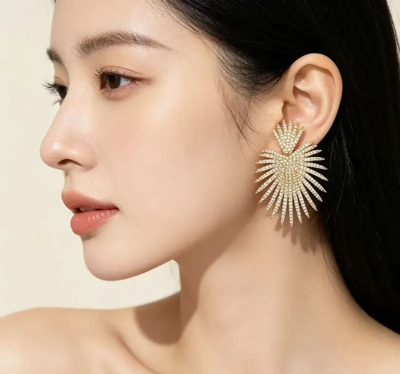 Boucles d’oreilles pendantes soleil en zircon pavé