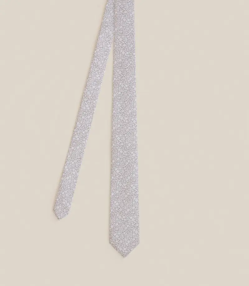 Cravate à fleurs beige