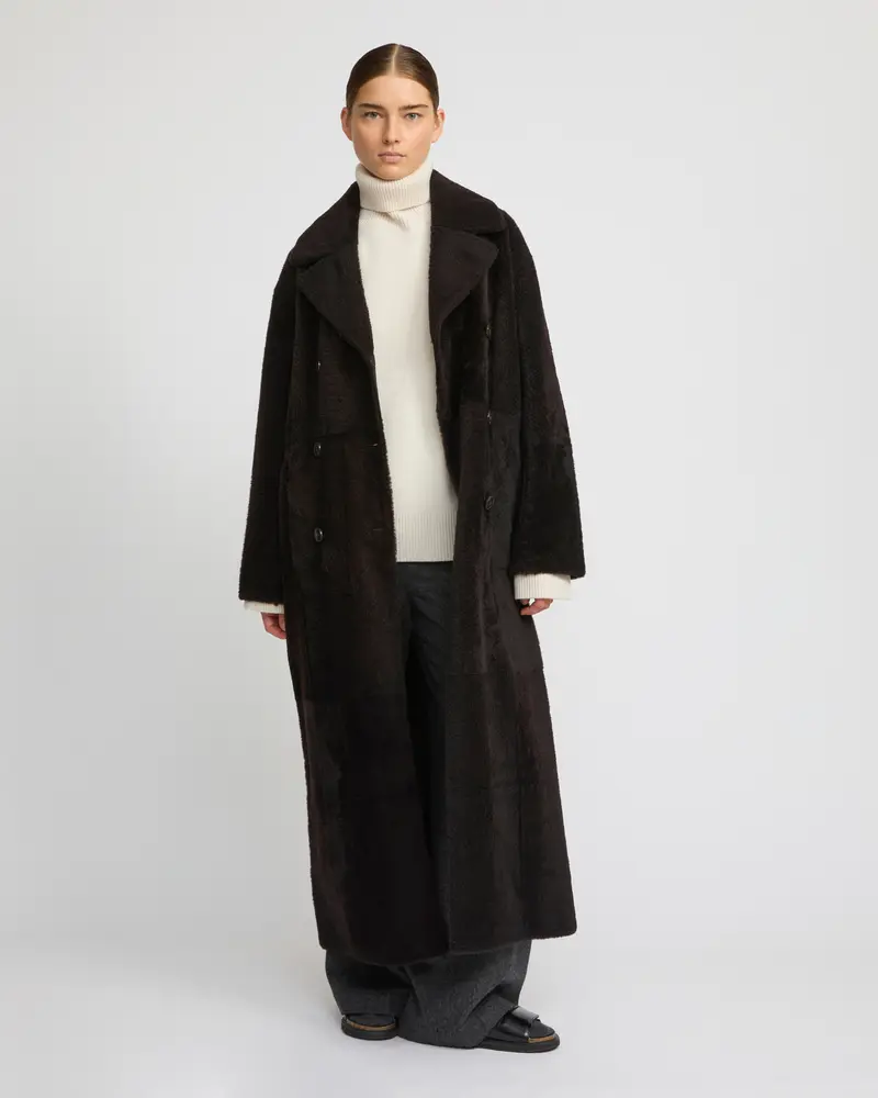 Double-breasted astrakan-style lambskin shearling long coat