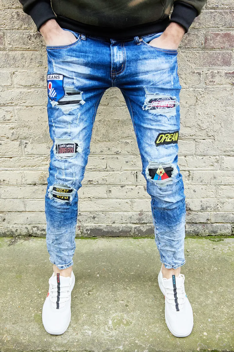 Jeans homme bleu délavé avec patch