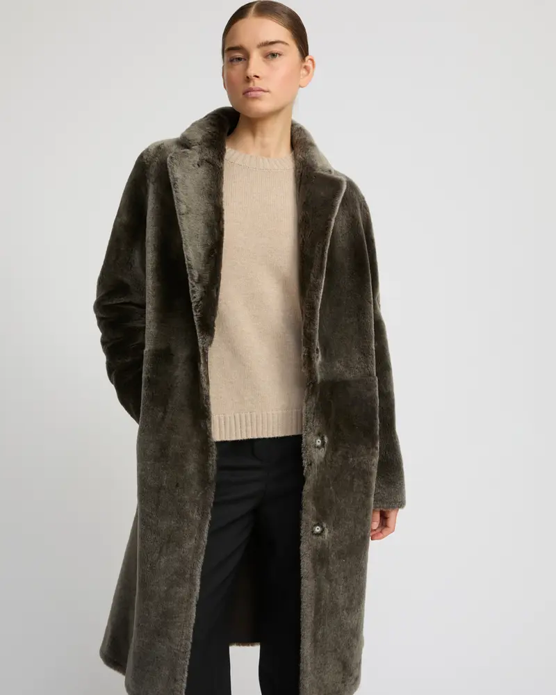Manteau réversible en peau lainée d'agneau mérinos