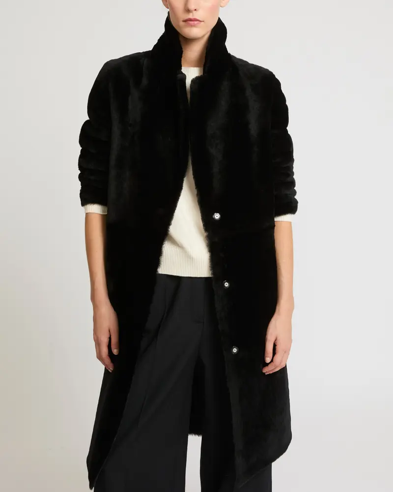 Manteau réversible en peau lainée d'agneau mérinos