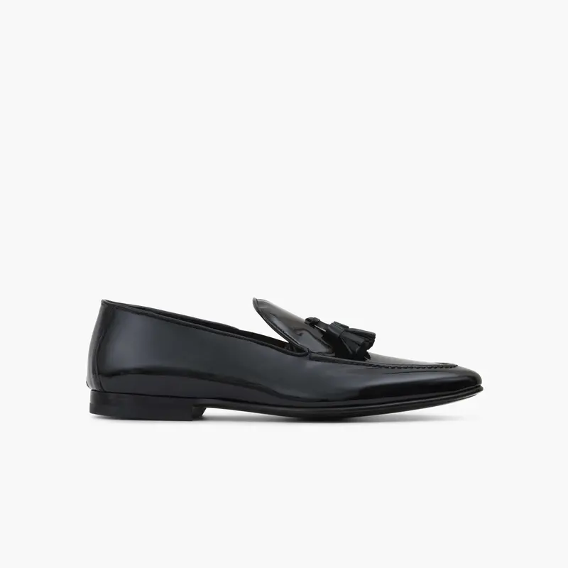 Mocassin Pompon en cuir de veau noir vernis