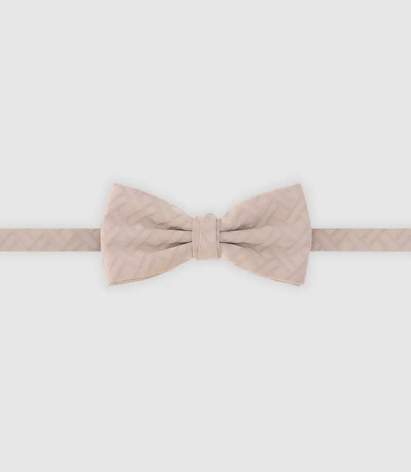 Nœud papillon avec motifs beige