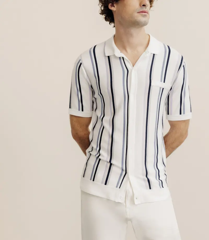 Polo boutonné en maille rayé écru