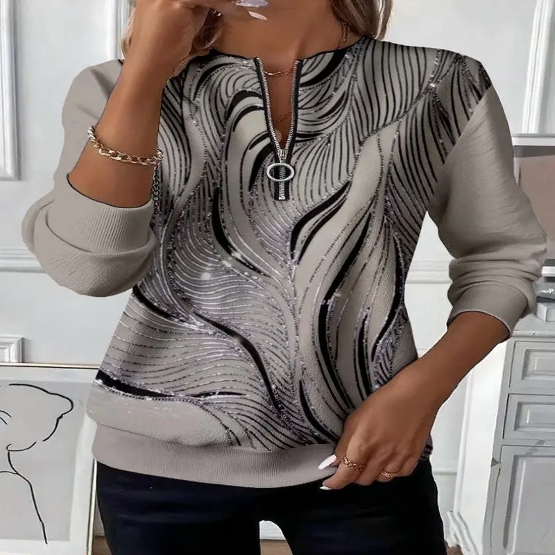 Pull femme ample à motif floral en relief