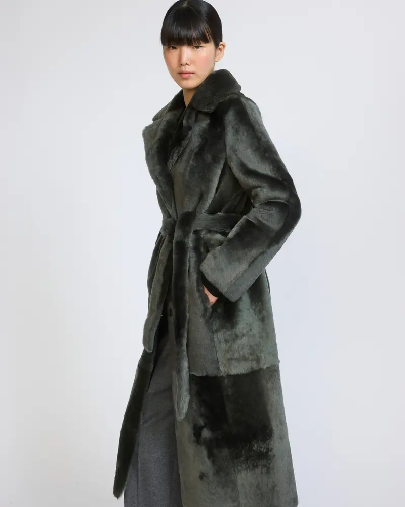 Reversible belted long shearling coat