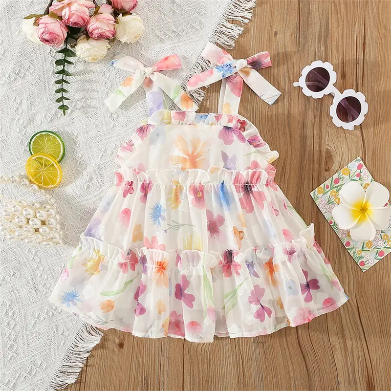Robe d'été en mousseline de soie pour filles, jupe de plage Cool, belle fleur fragmentée, mode dames, jupe sans manches avec nœud