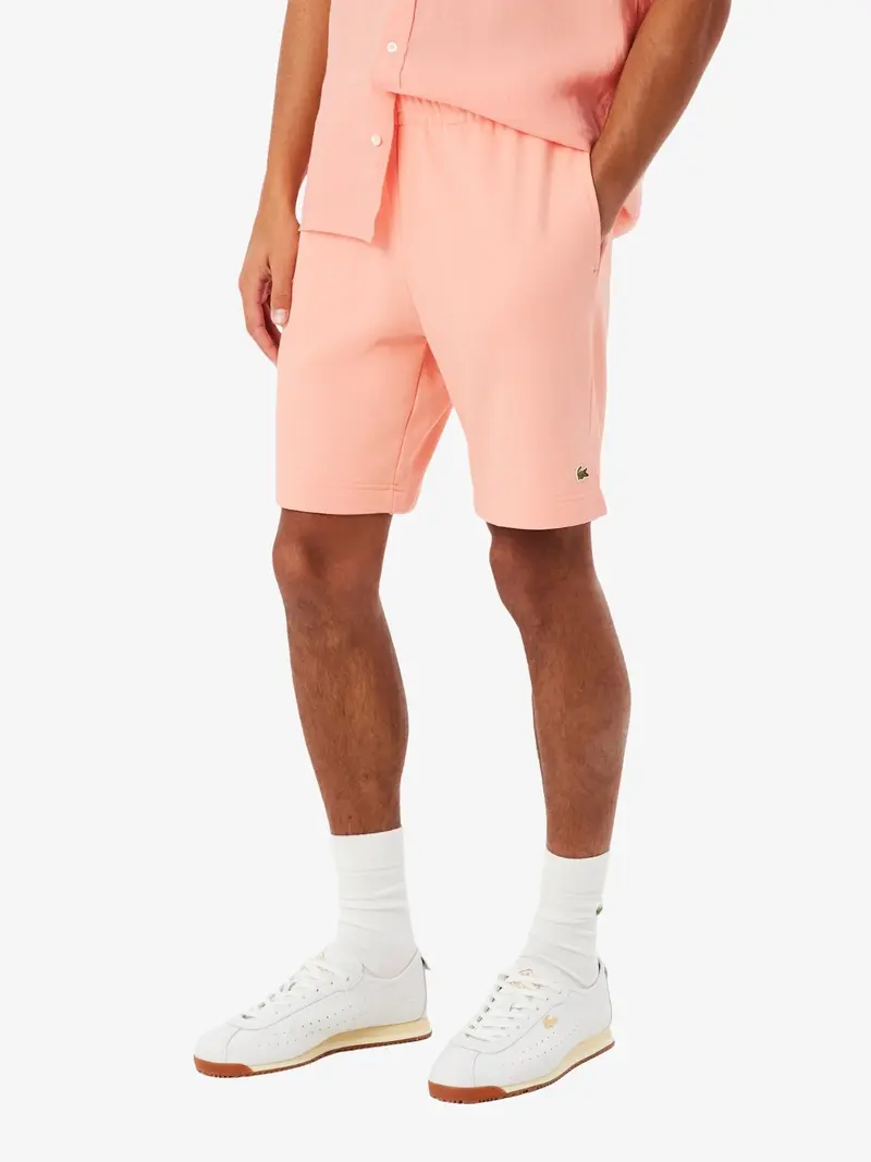 Short Lacoste rose en molleton