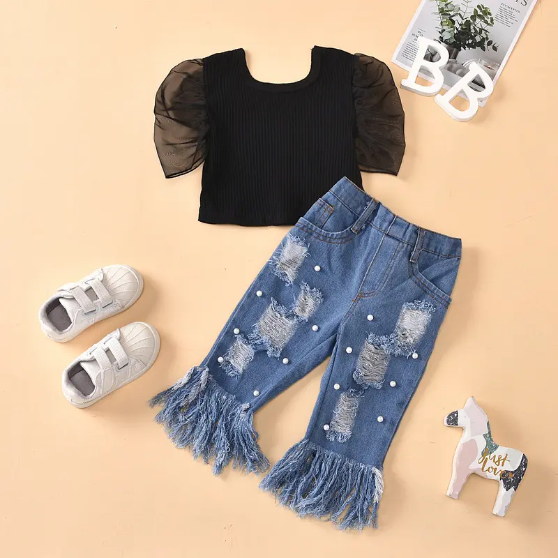 Veste en jean enfant noire, effet déchiré et bords bruts